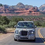 The new electric black cab shines in the desert heat